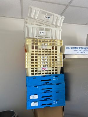boxes stacked on top of each other in a room