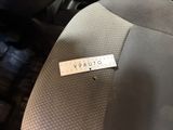 a picture of a seat in a car with a label on it