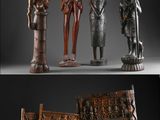 un ensemble de quatre figurines en bois sculpté représentant des personnages et des animaux