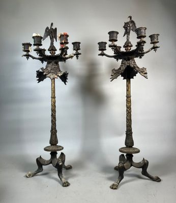 pair of antique brass candelabs with birds and flowers on them