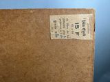 a close up of a brown book with a label on it