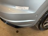 a close up of a car with a sticker on it ' s bumper