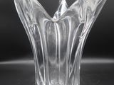 an image of a clear glass vase sitting on a table