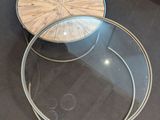 two tables that are sitting on the floor