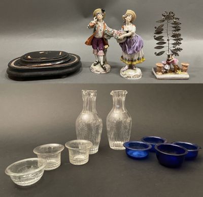 many different types of glass items displayed on the table