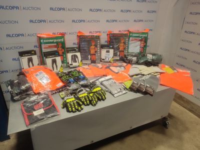 a table with a lot of items on it in front of a wall