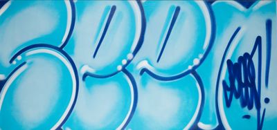 a picture of a blue and white wall with graffiti on it