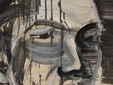 a painting of a man ' s face on a piece of paper