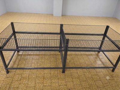 a metal bed frame with a metal frame on top of it