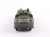 a toy army vehicle that is sitting on a white surface