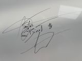 autographe signé représentant une moto, avec le nom d'un homme