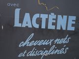 a sign that says lacene on the side of a building