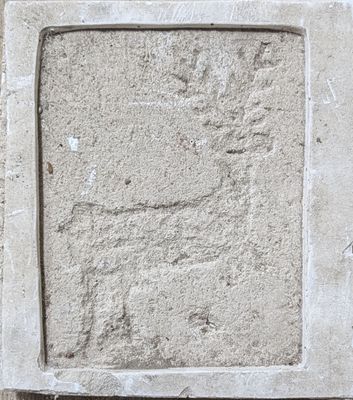 cement block with a square hole in the middle of it