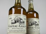 two bottles of chateau chaly are sitting next to each other