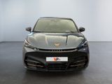 the front view of a black sports car parked in a showroom