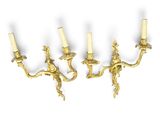 pair of antique brass wall sconces in the style of person