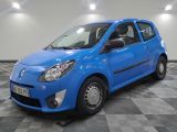 a picture of a blue car parked on a checkered floor