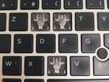 a close up of a computer keyboard with the letters on it
