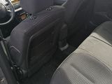 the interior of a car with the front seats folded down and the passenger seat down