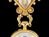 une image montrant un gros plan d'une horloge sur fond noir