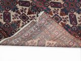 an image of a close up of a rug on a white surface