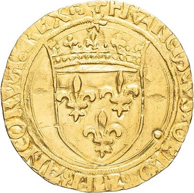 a close up of a gold coin with a crown on it