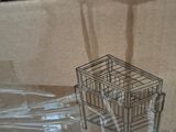 a box that has a cage on top of it