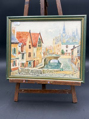 an image of a painting on a easel with a city in the background