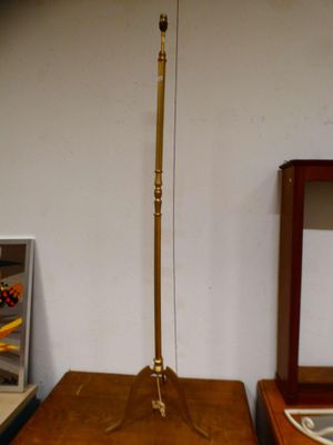 a lamp that is sitting on a table next to a mirror