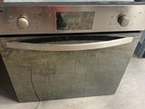 an image of a stainless steel oven sitting on top of a floor
