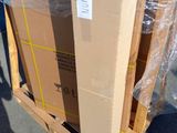 a cardboard box sitting on top of a pallet in the street