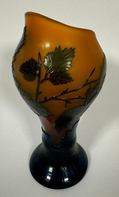 a vase with a design on it on a white surface