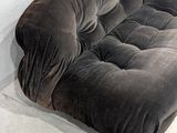a couch that is sitting on the floor in a room