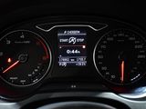 a close up of a car dashboard with a speedometer and gauges