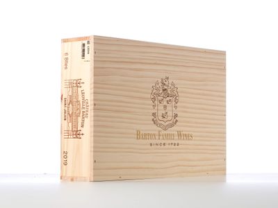 a wooden box with a wine bottle inside of it