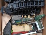 a box full of toy trains sitting on a table