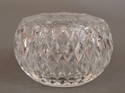a clear glass vase with a diamond pattern on it