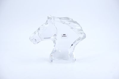 crystal figurine of a horse head on a white background