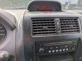 a car dashboard with a clock on the dash