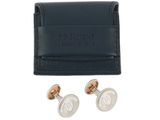 a pair of cufflinks and a leather wallet on a white background
