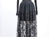 a black lace dress with long sleeves on a mannequin mannequin mannequin mannequin mannequin mannequin mannequin manne