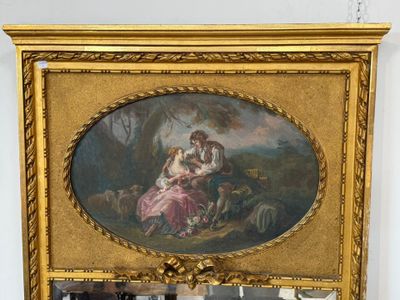 a picture of a painting hanging on a wall above a mirror