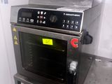 an oven that is sitting on top of a table