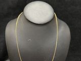 a gold chain necklace on a mannequin mannequin mannequin mannequin mannequin mannequin mannequin mannequin manne