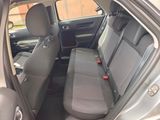 the back seats of a car are empty with no people in it