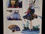 the back of a box with a picture of a girl in a dress and a fan