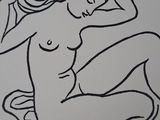 a drawing of a nude woman sitting on the ground