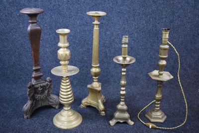a lot of candles that are sitting on a table