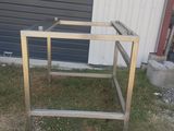 an image of a metal side table in the grass