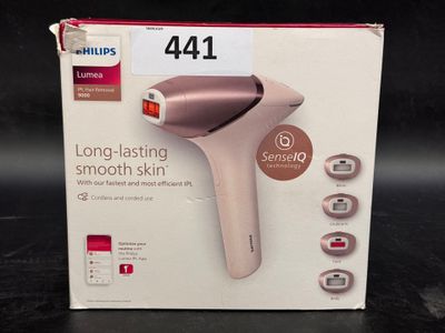 a box with a hair dryer in it on a table
